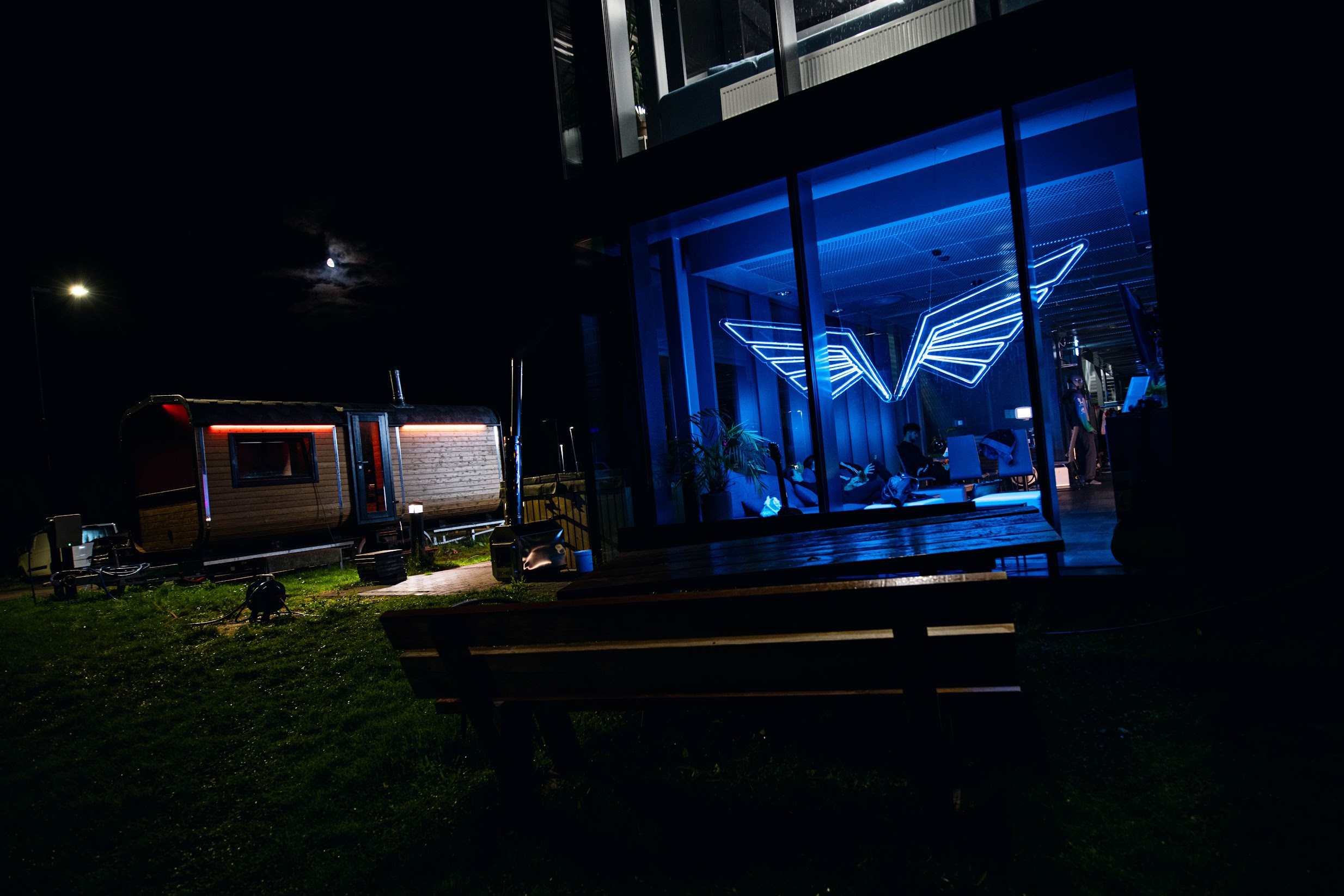 FlyTribe tunnel exterior at night